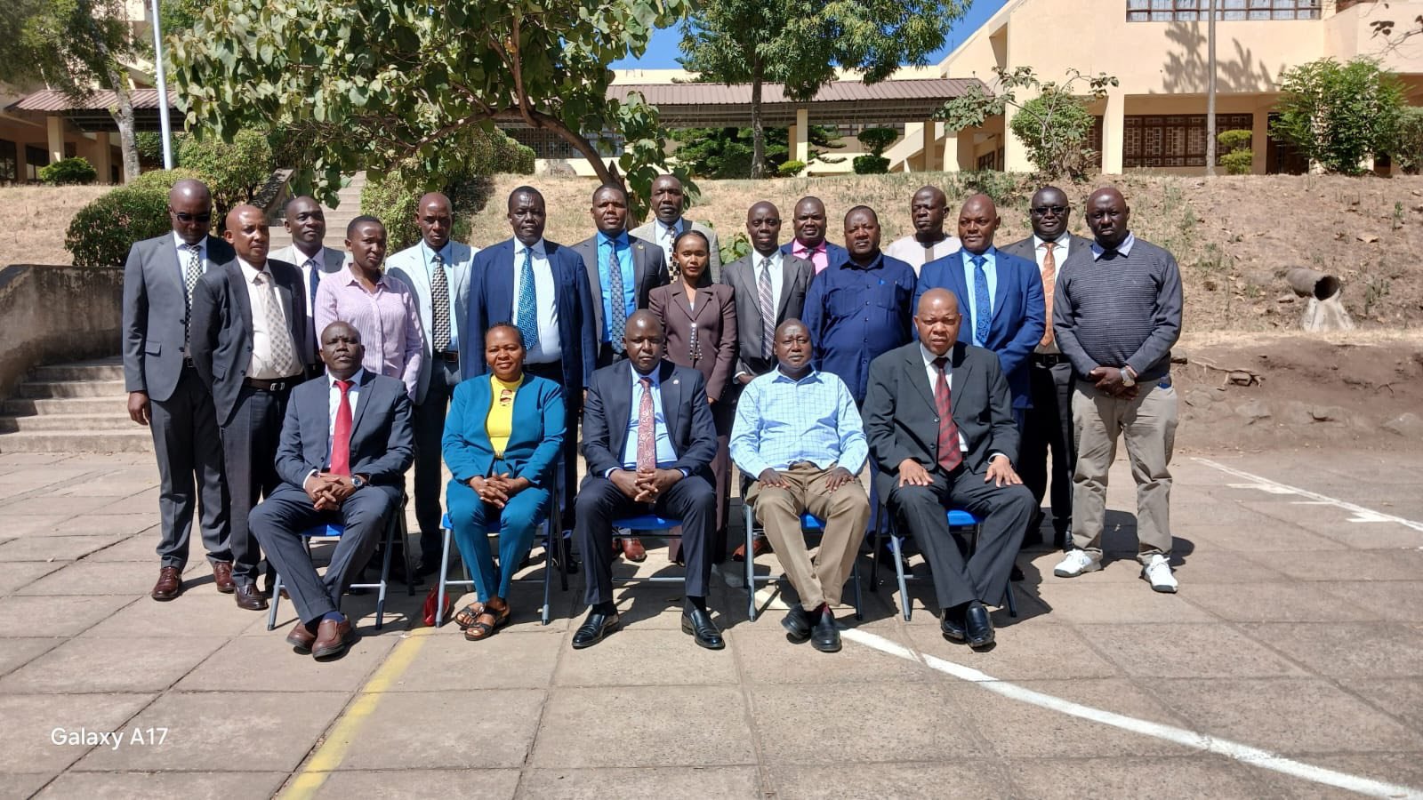 senior officers at Directorate of Criminal Investigations (DCI) taking photo outside at high-level Anti-Money Laundering (AML) sensitisation seminar in Mombasa