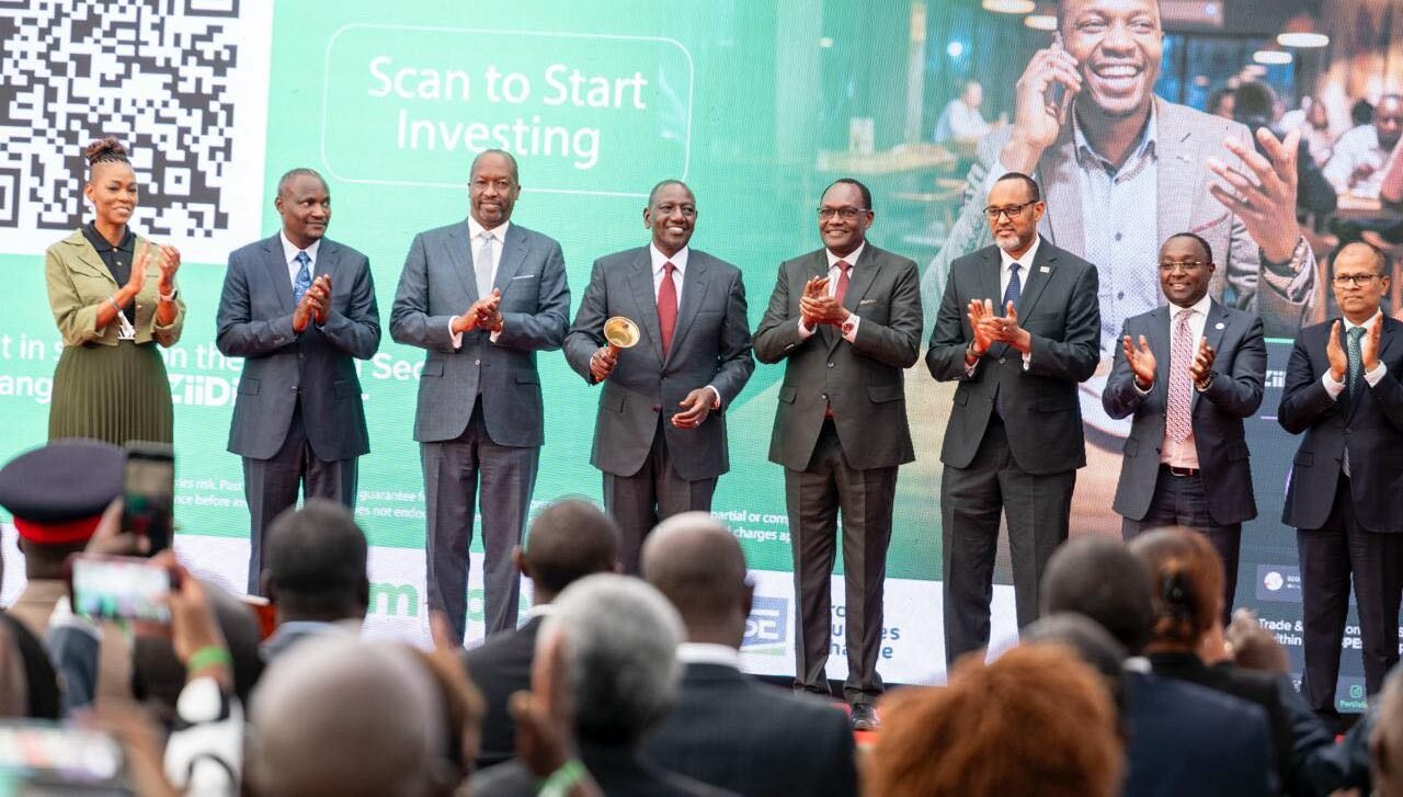 President William Ruto ringing the bell at the Nairobi Securities Exchange.