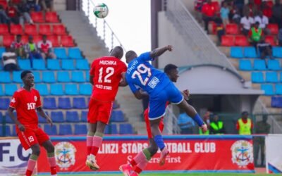 Kenya Police FC player Muchika and Ulinzi Stars FC player Simuyu contest a header during a match at Ulinzi Sports Complex.