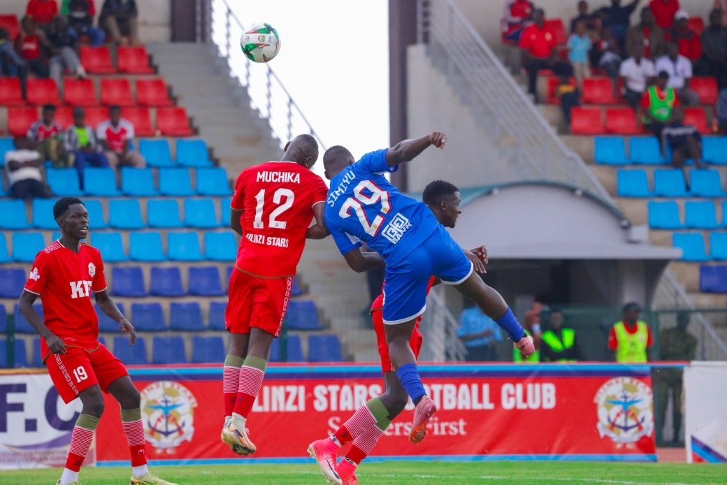 Kenya Police FC player Muchika and Ulinzi Stars FC player Simuyu contest a header during a match at Ulinzi Sports Complex.