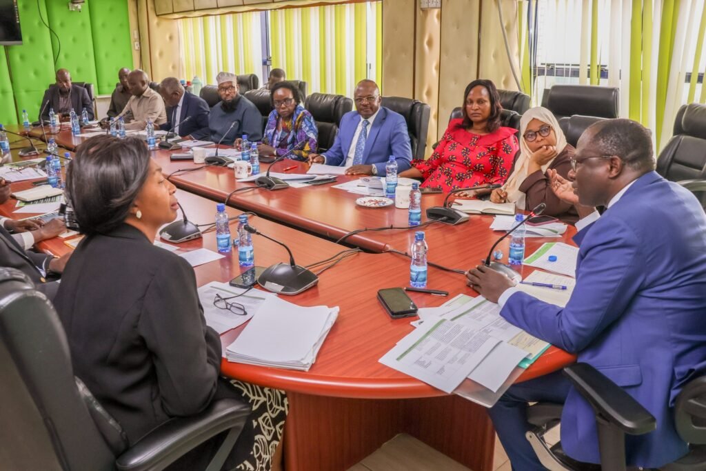 IEBC Chairperson Erastus Ethekon in talks with members of the COIN-10 delegation during a consultative meeting.