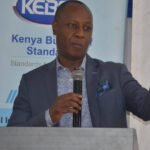 Jonathan Mueke speaking during a farmers’ training forum at a hotel in Meru.