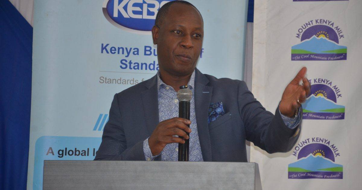 Jonathan Mueke speaking during a farmers’ training forum at a hotel in Meru.