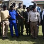 Molo Area Commander Geoffrey Chetivia and Elburgon Area Commander Maurine Ondigo speak during a launch event with residents of Turi Ward in Molo Sub-County, Nakuru County.