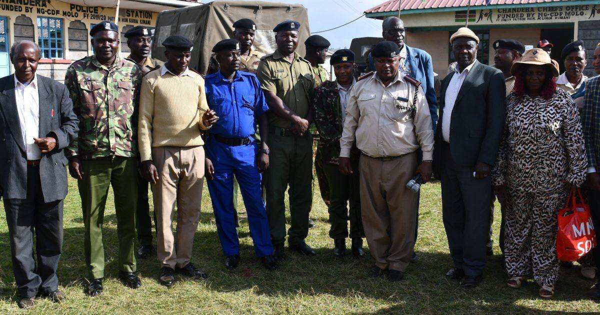 Molo Area Commander Geoffrey Chetivia and Elburgon Area Commander Maurine Ondigo speak during a launch event with residents of Turi Ward in Molo Sub-County, Nakuru County.