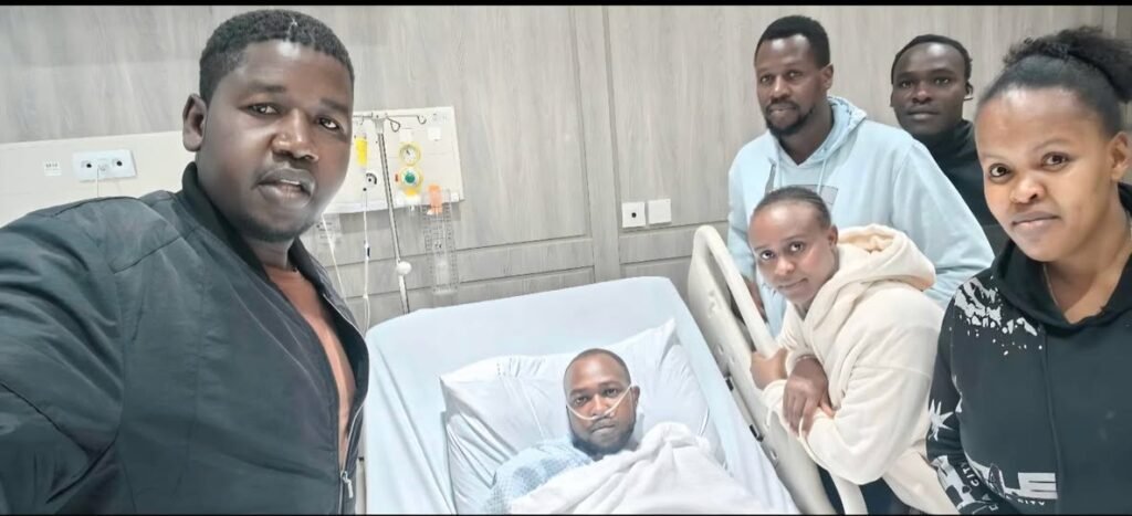 Kenyans in Dubai takes selfie with Kevin Kimutai in a Dubai ICU