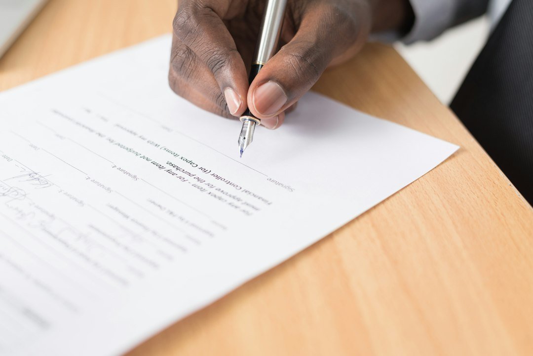 Property documents on a desk illustrating land verification and title searches in Kenya.