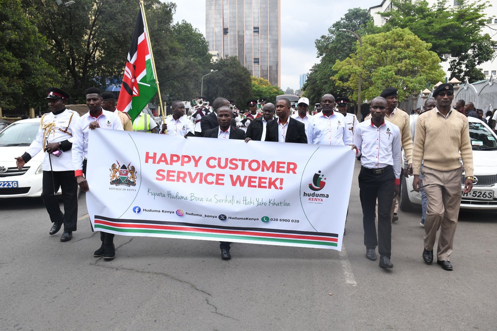 Kenyan public service officials taking part in a Customer Service Week procession.