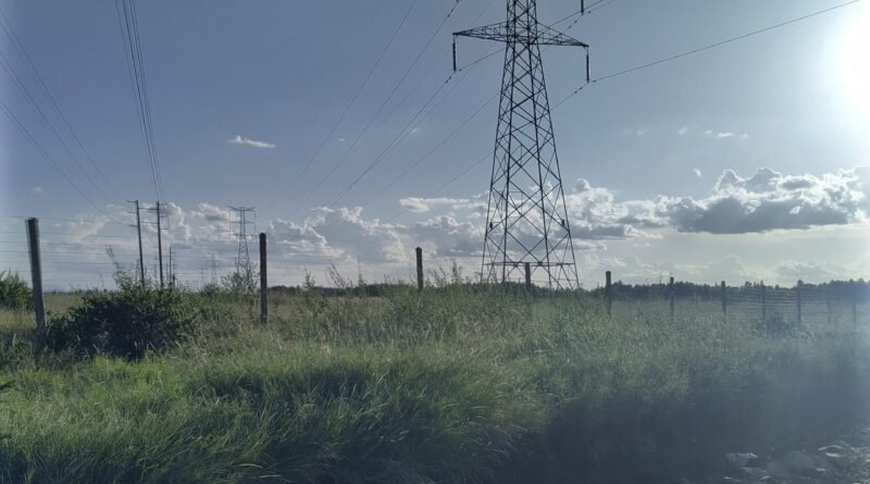 High-voltage electricity pylons in Kenya photographed in 2020; not the Baringo last-mile project